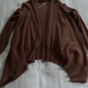 Soft, soft, soft rose-color asymmetric hem cardigan.